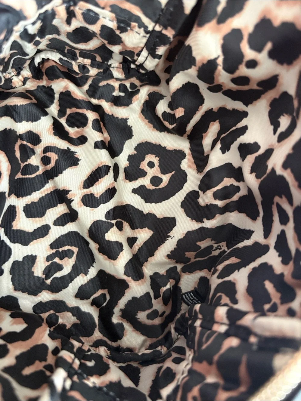 Victoria’s Secret black satin makeup bag, leopard print interior